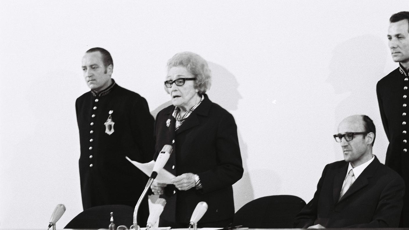 Elsa Franconi-Poretti (1895-1995), PLR. Giornalista, scrittrice, attrice e politica, fu corrispondente per la stampa svizzera a Parigi nonché attrice e autrice teatrale e di commedie dialettali. Fu una dichiarata sostenitrice del suffragio femminile e dei diritti delle donne, per cui continuò a battersi anche in Gran Consiglio.