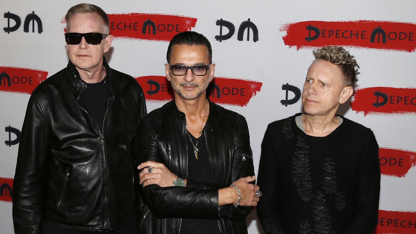 Andrew Fletcher, Dave Gahan e Martin Gore alla conferenza stampa di Milano