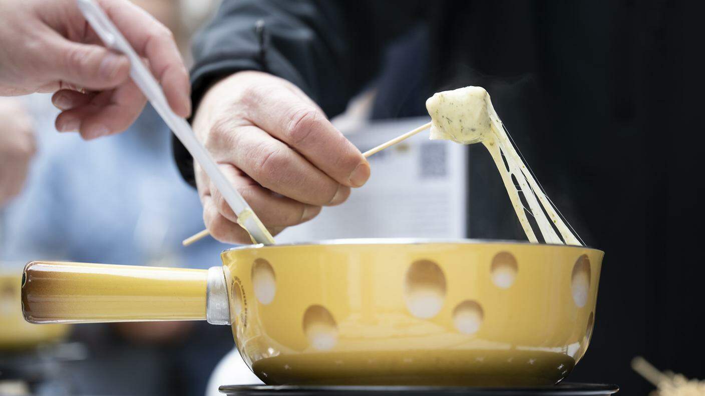 Fondue al formaggio, un'icona svizzera