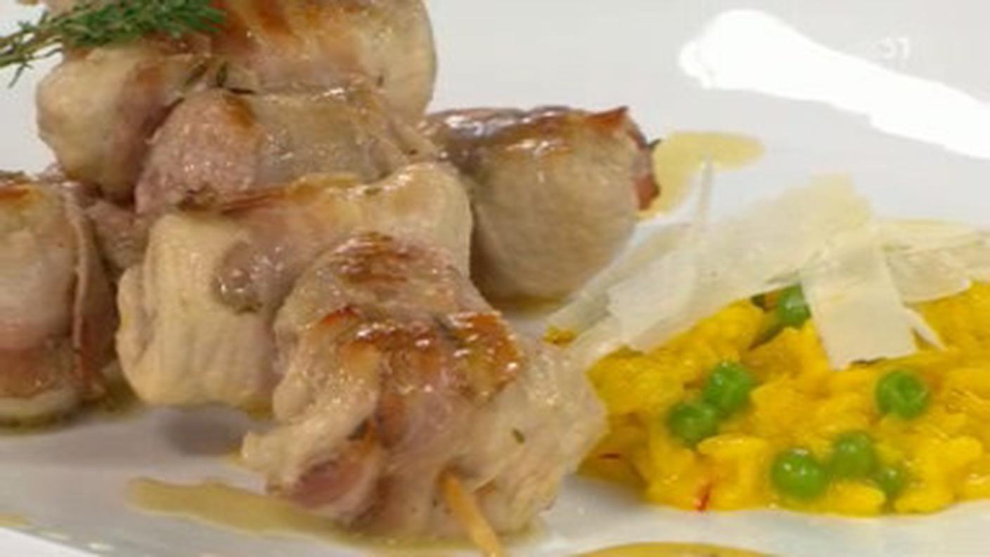 Uccelletti scappati con risotto allo zafferano e piselli