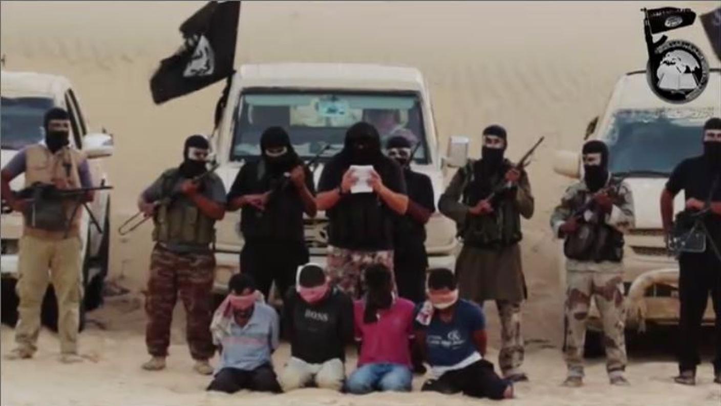 Milizie isis con ostaggi