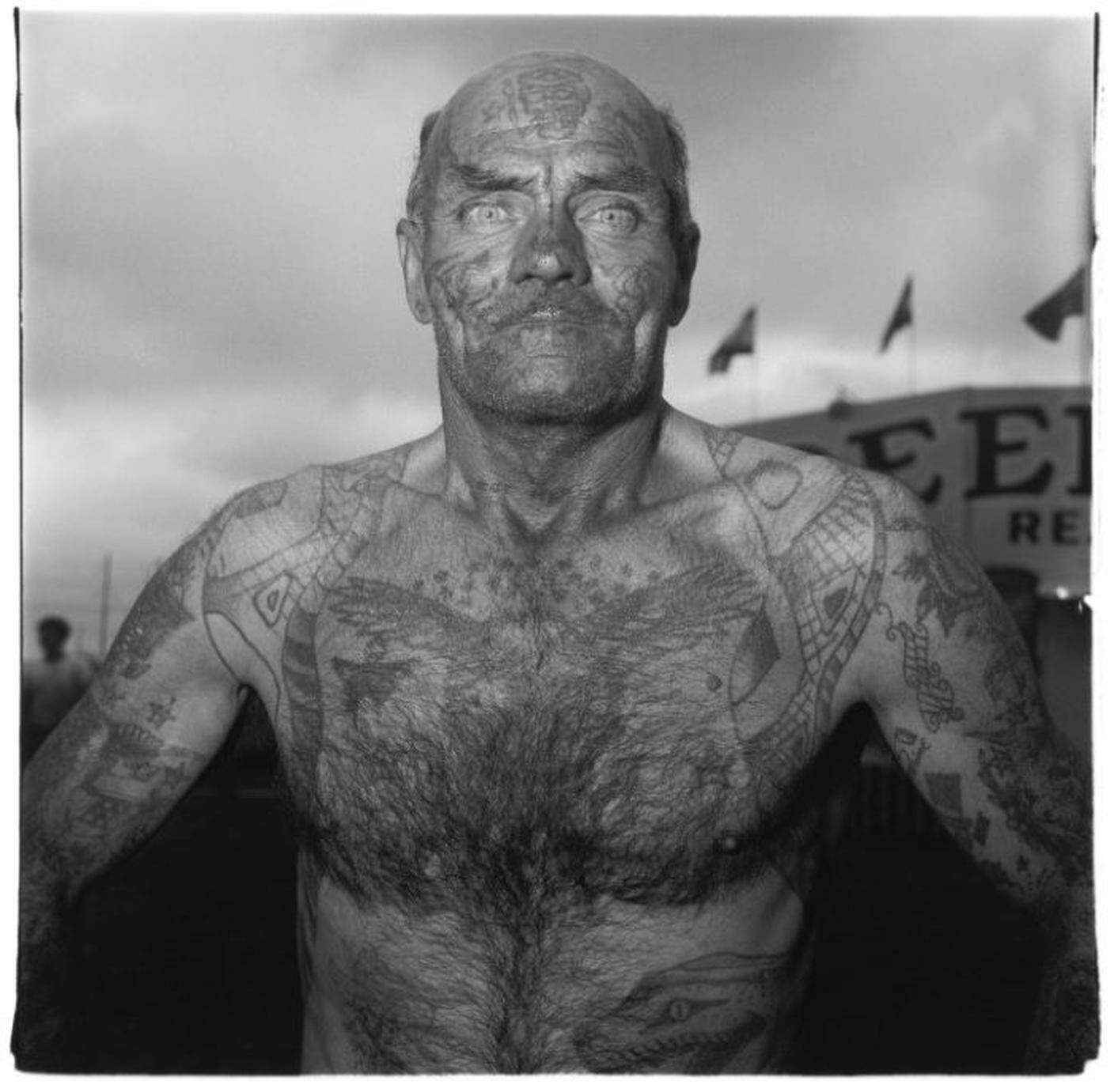 Diane Arbus, Tattoed Man at a Carnival, 1970. ╕ The Estate of Diane Arbus.jpg