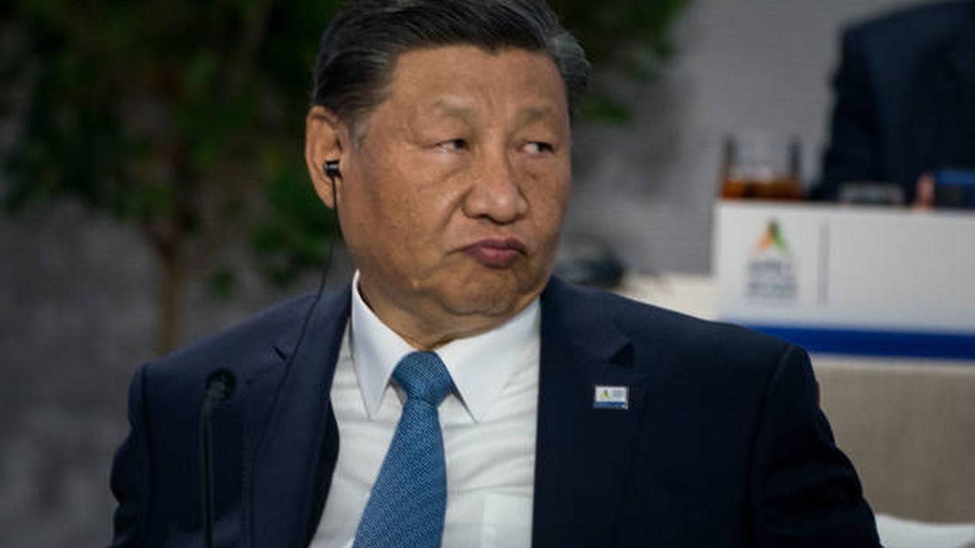 Xi