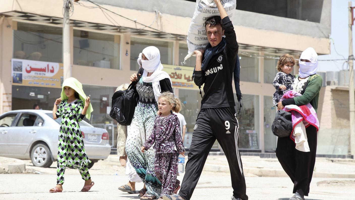 Gli yazidi in fuga dai jihadisti a Mosul