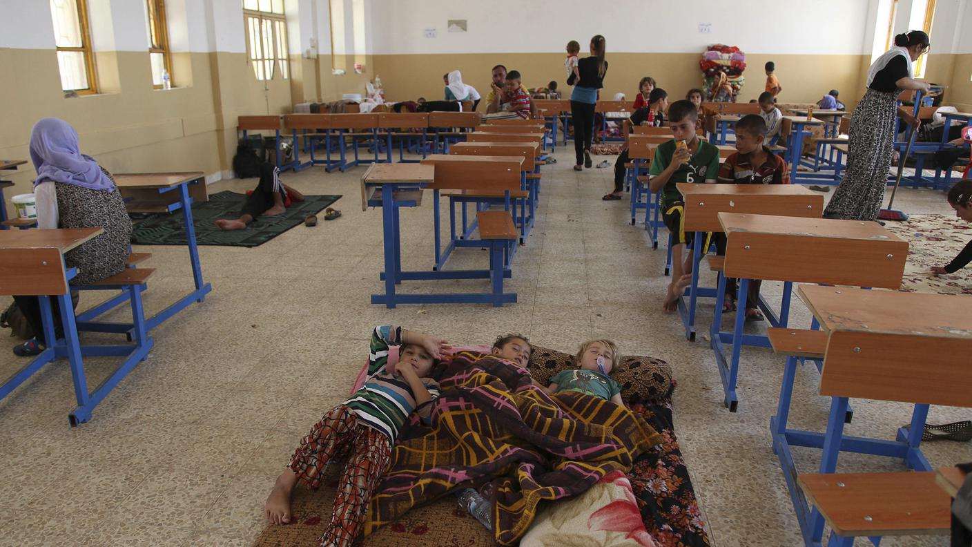 Gli yazidi in fuga dai jihadisti a Mosul