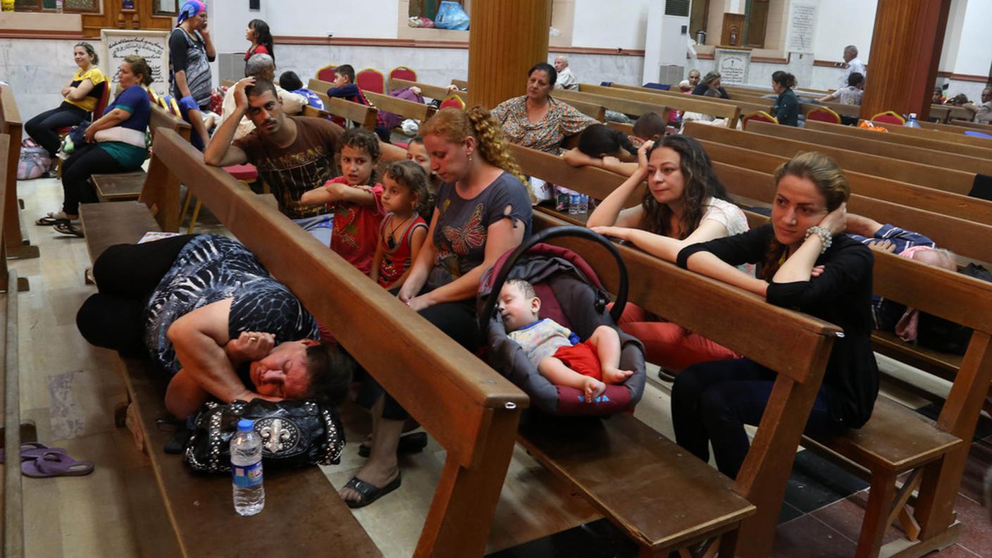 Giovedì sera, i profughi nella chiesa di San Giuseppe di Erbil, Iraq