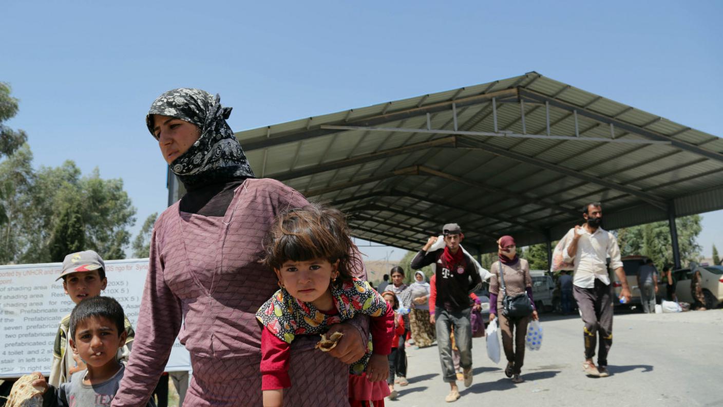 Yazidi in fuga dall'IS