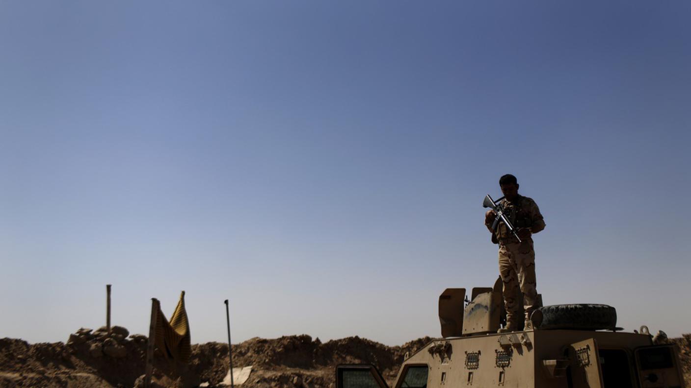Un combattente a nord di Baghdad