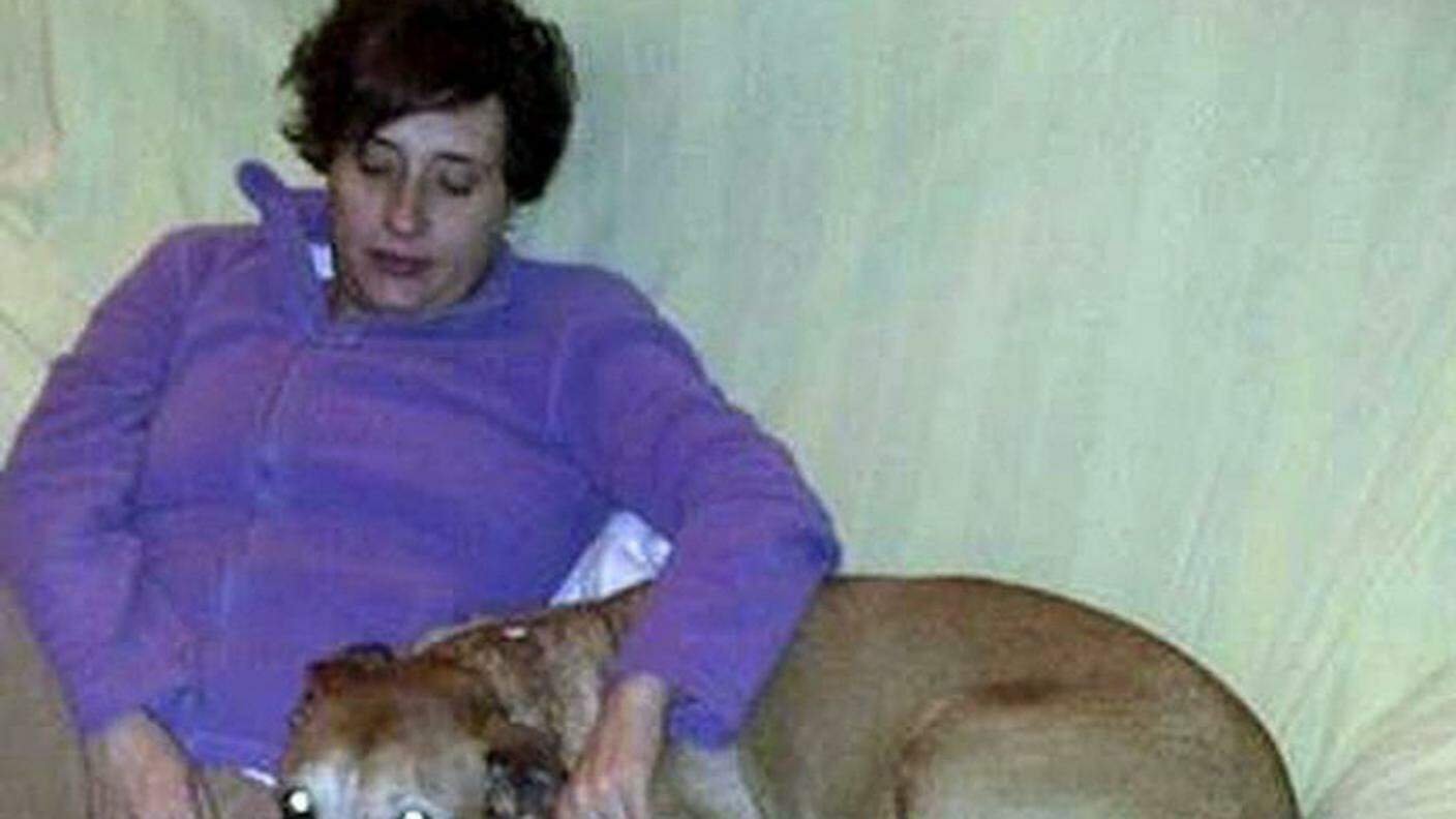 Teresa con il suo cane, soppresso dopo il contagio