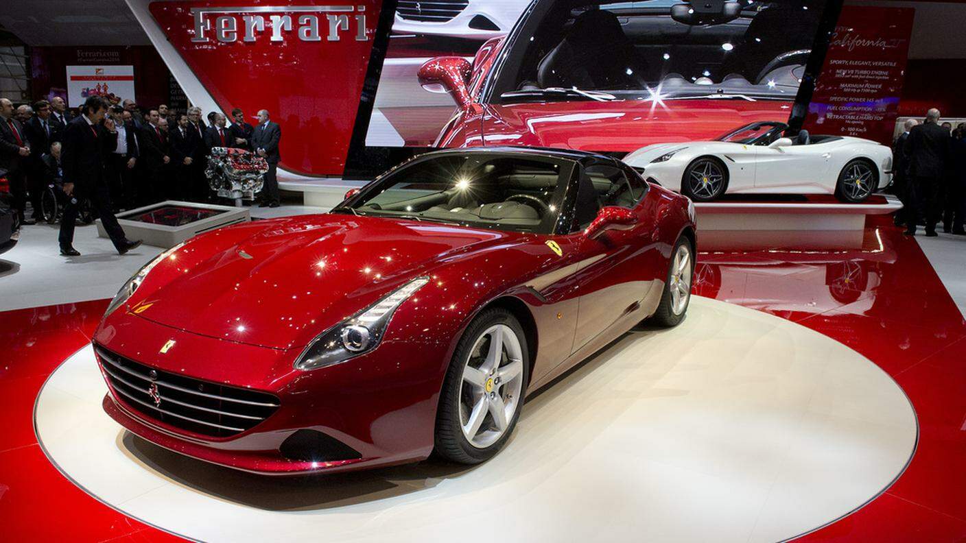 La Ferrari, nella foto lo stand al Salone di Ginevra, sarà quotata in borsa