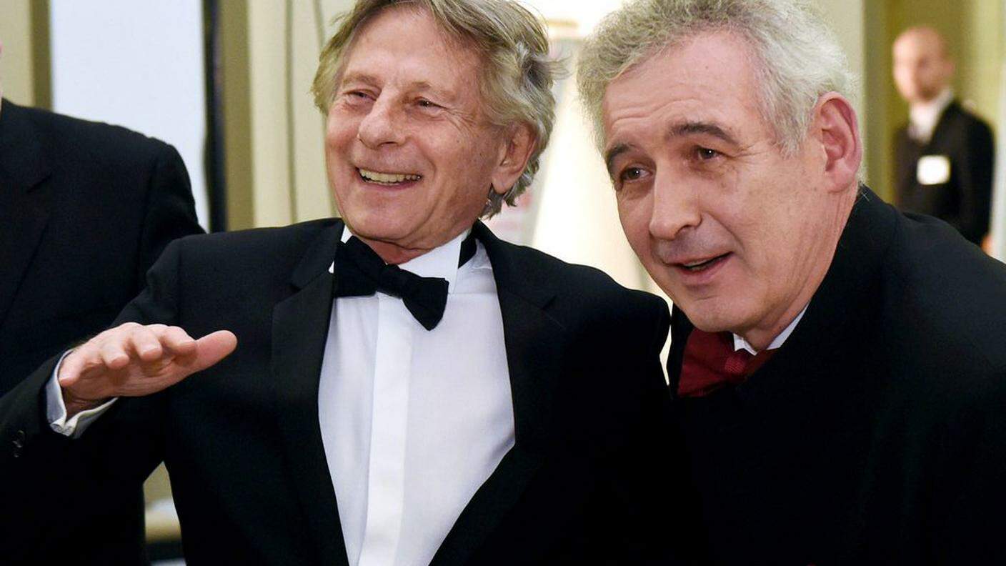 Polanski, a sinistra, all'inaugurazione del nuovo museo