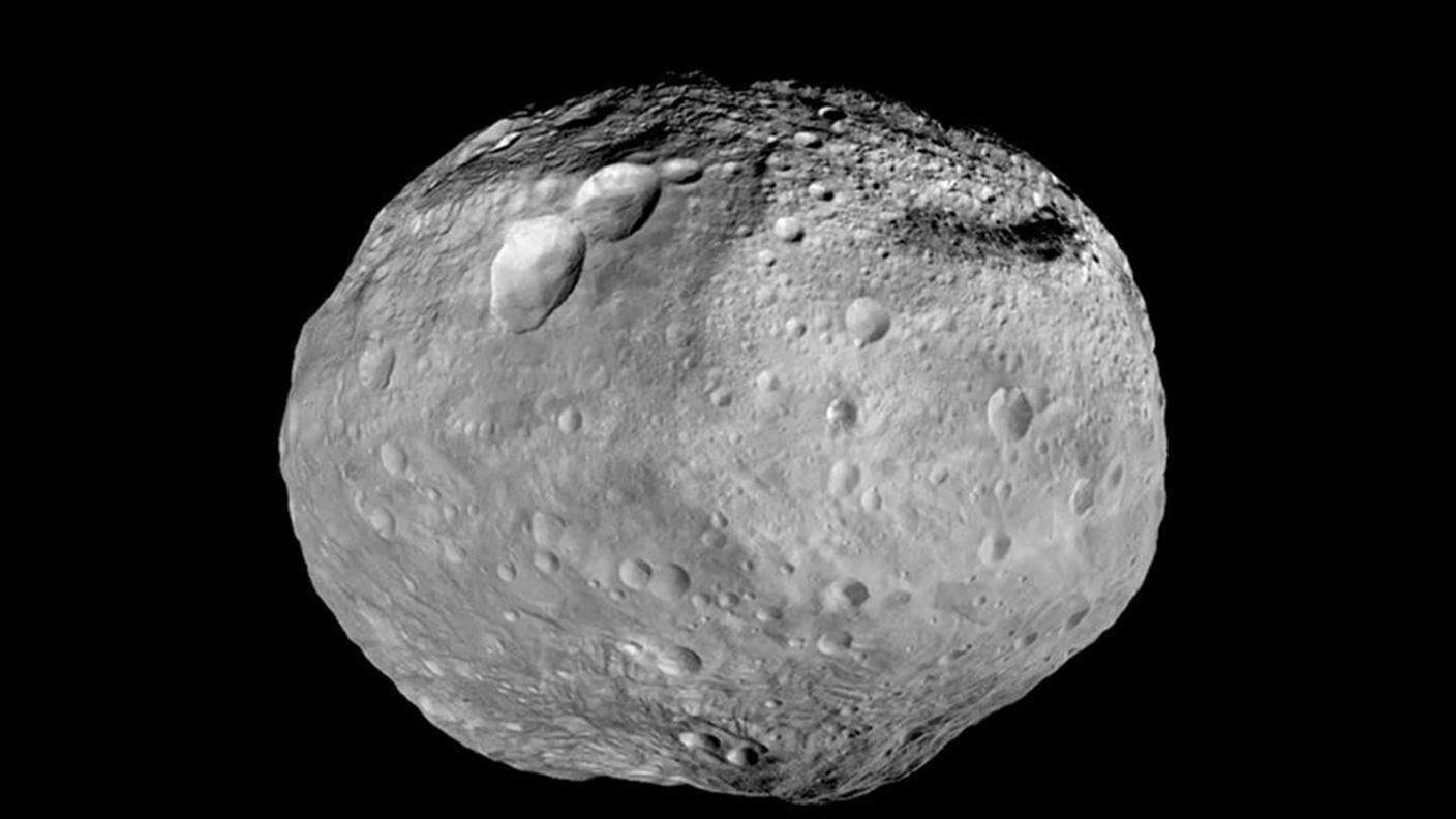 Sarà il più grande a passare vicino a noi fino al 2027, qui sopra l'asteroide "Vesta"