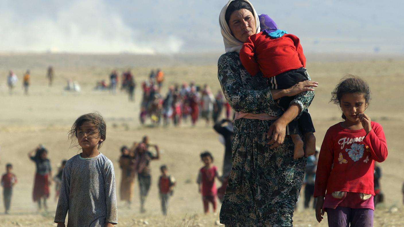 Yazidi in fuga dall'IS