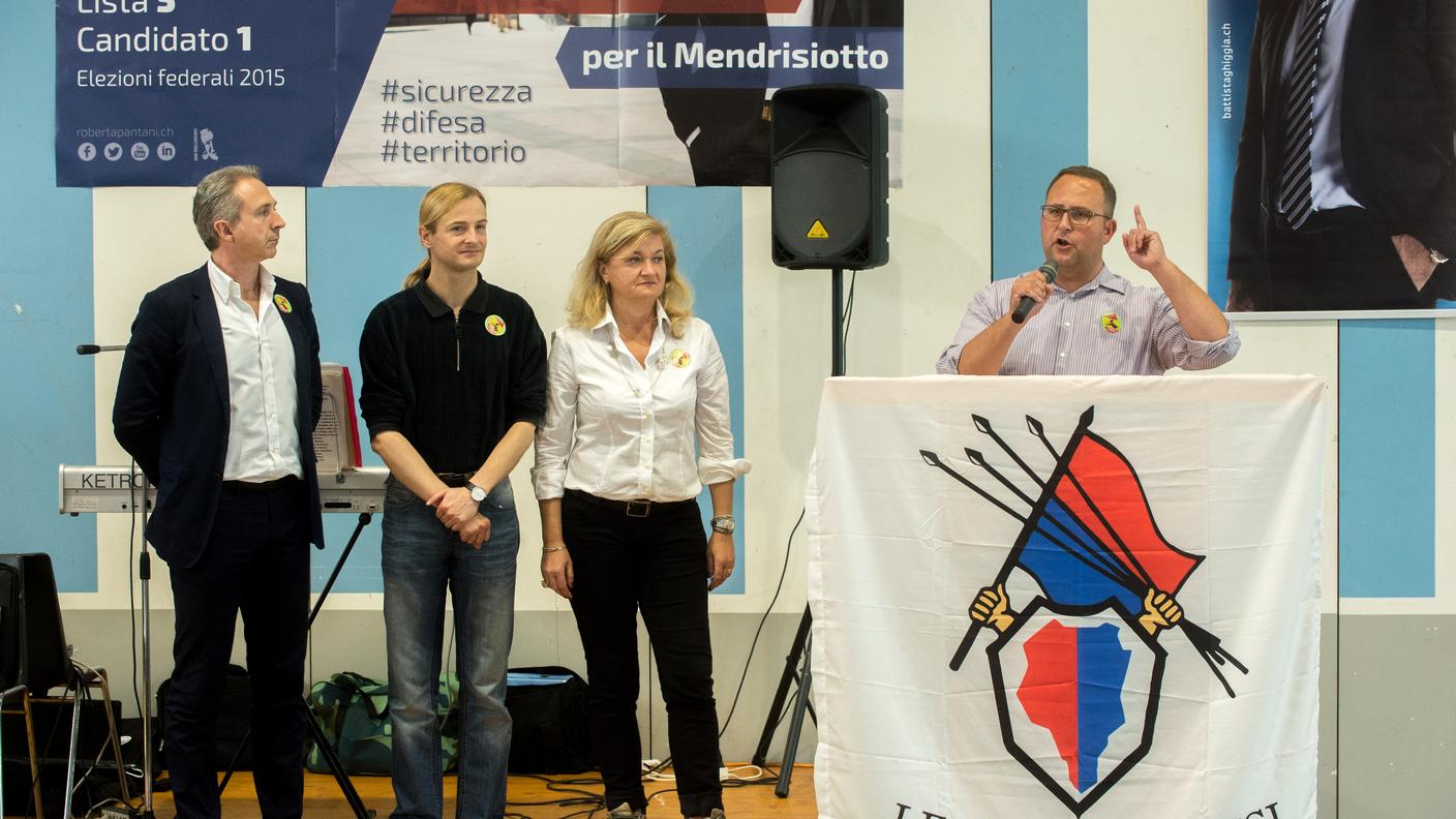 I tre candidati durante il discorso all'assemblea di Norman Gobbi