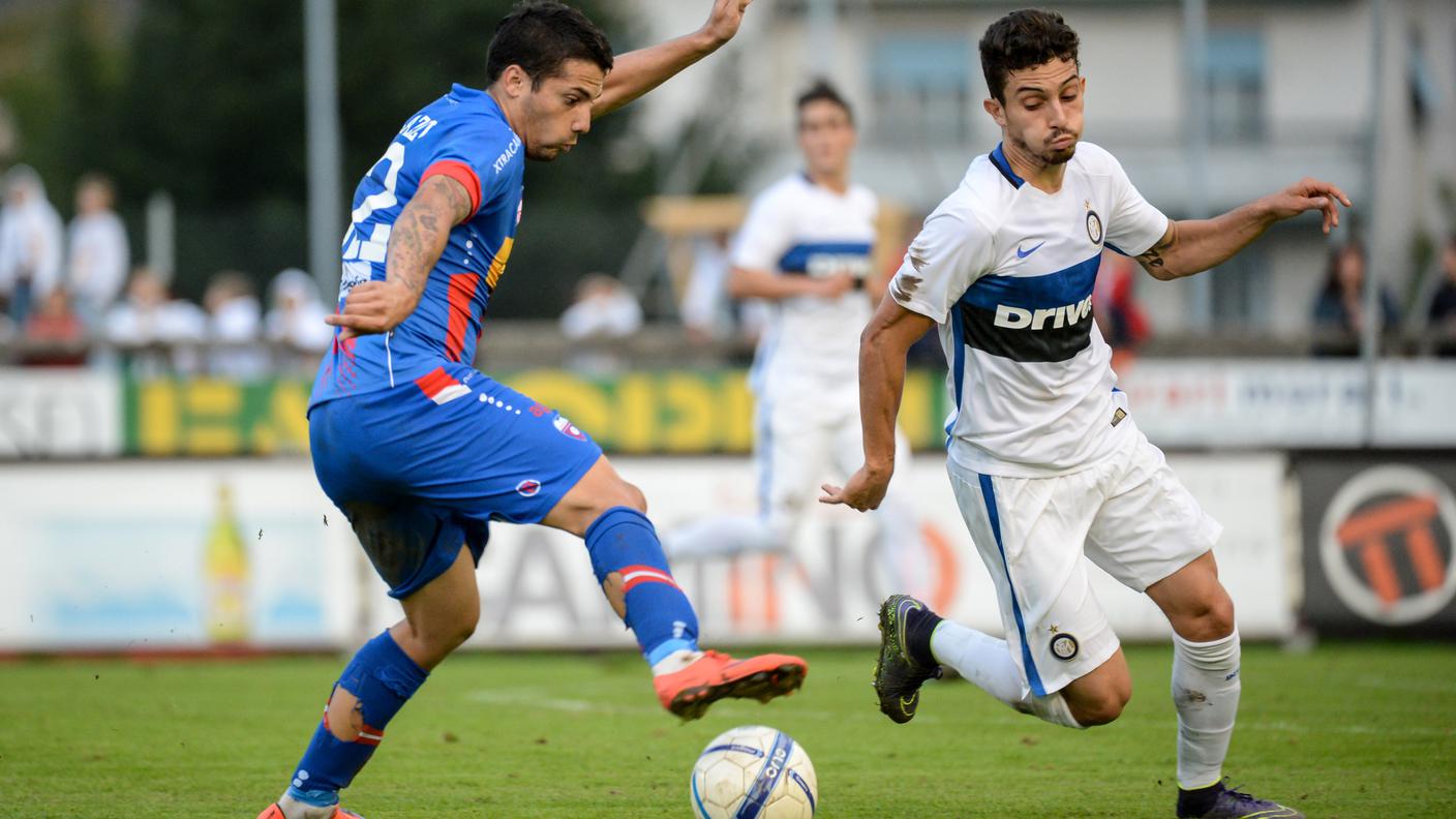 L'autore della prima rete rossoblù Melazzi contro Telles