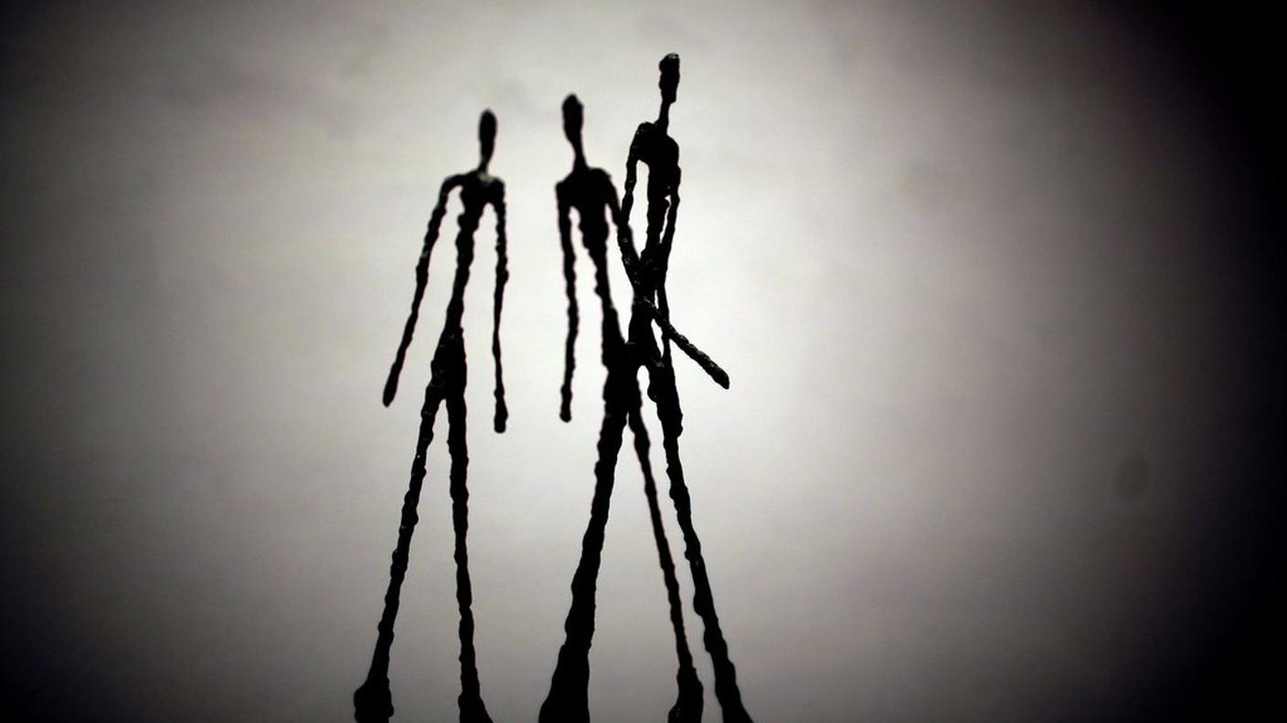 Trois hommes qui marchent