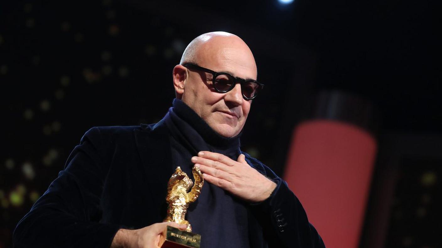 Gianfranco Rosi con la meritata statuetta