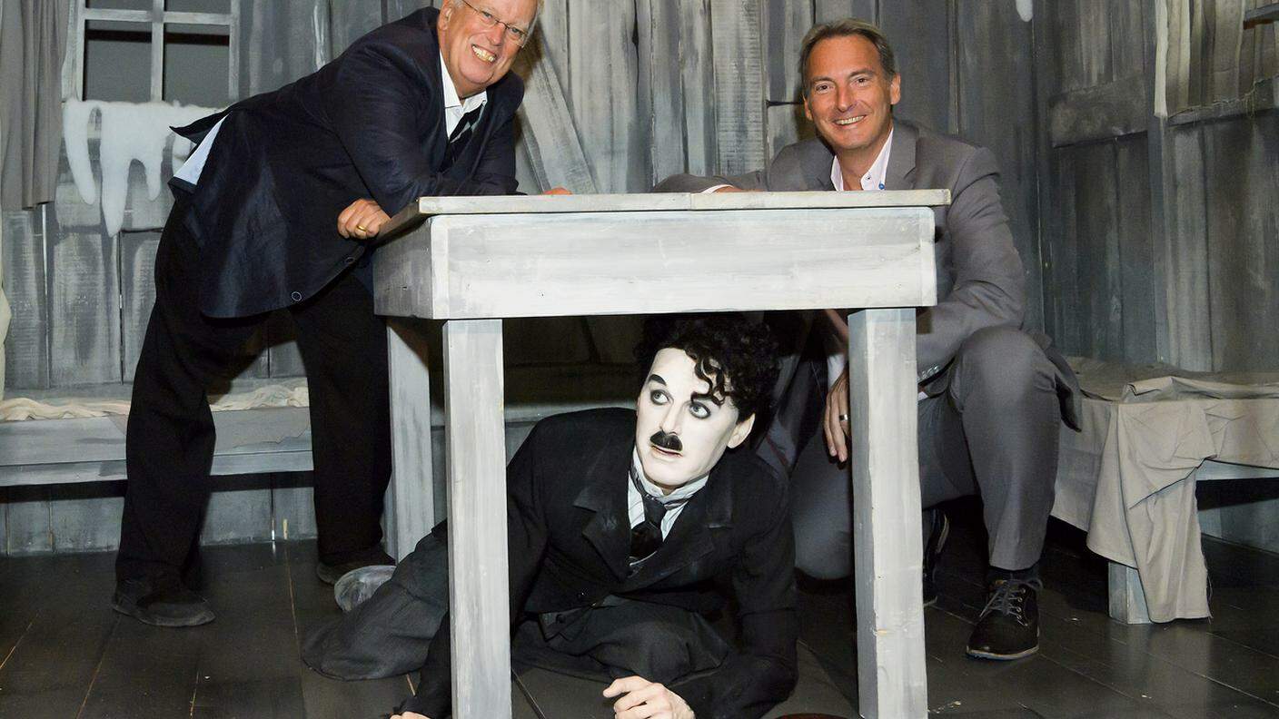 Eugene Chaplin, il direttore del museo Jean-Pierre Pigeon... e Charlot