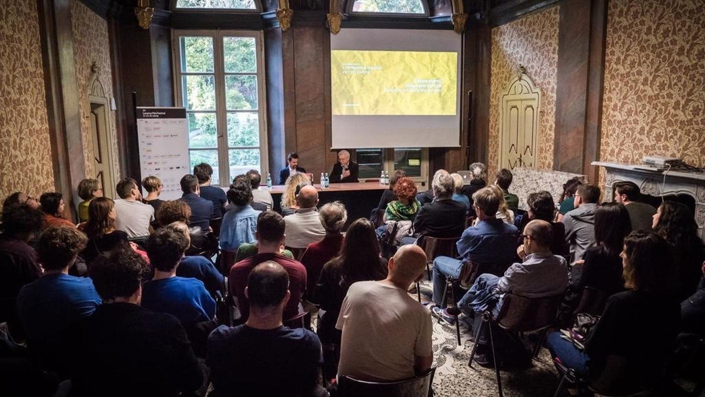 Biblioteca cantonale affollata per Paolo Mereghetti