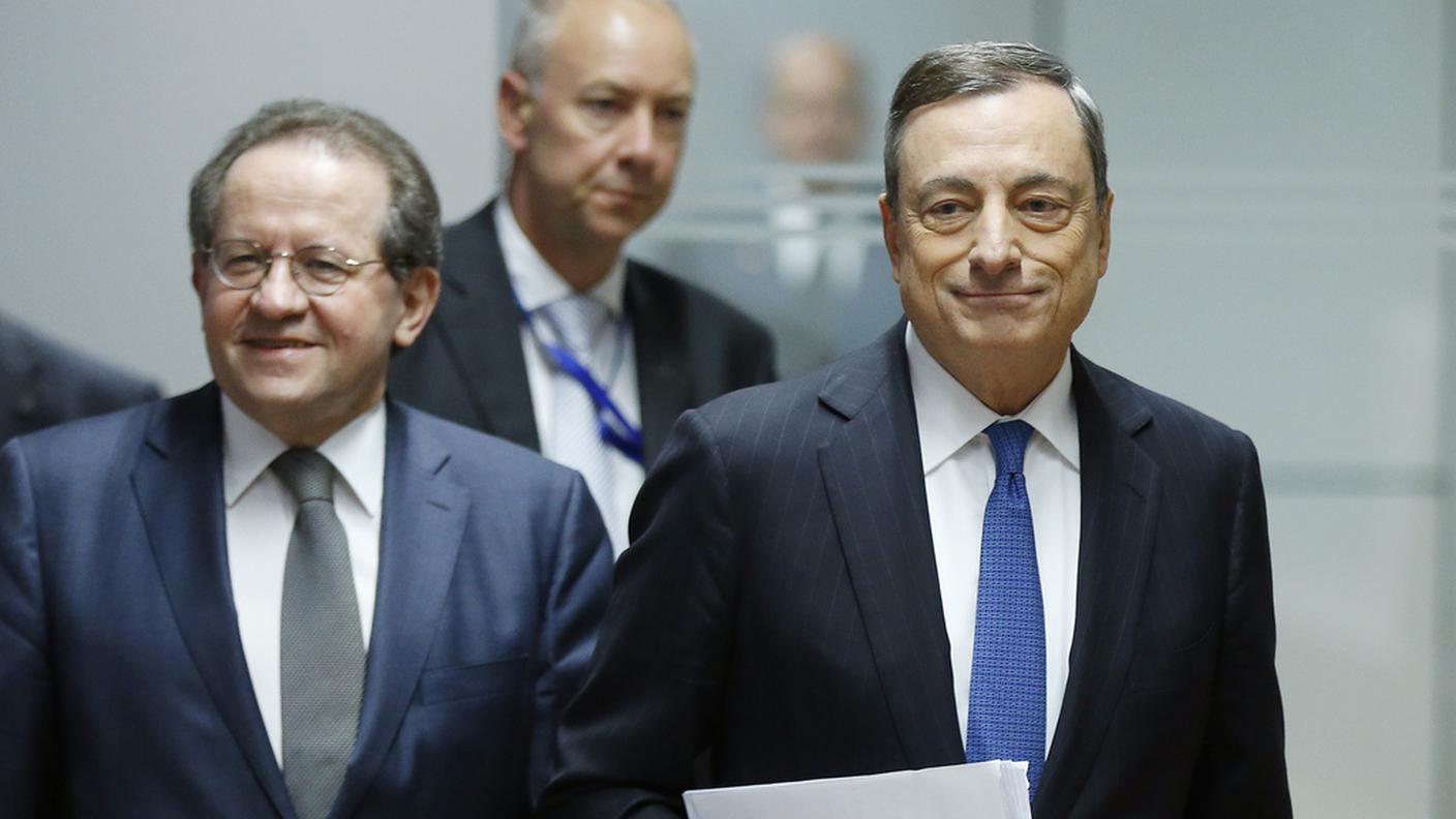 A destra, Mario Draghi