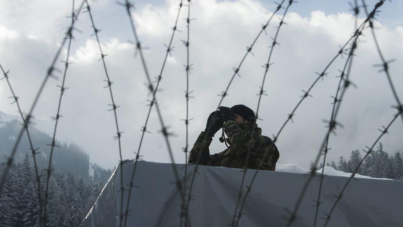 WEF A Swiss army soldier patrols with binoculars, during a media visiting day, ky.JPG