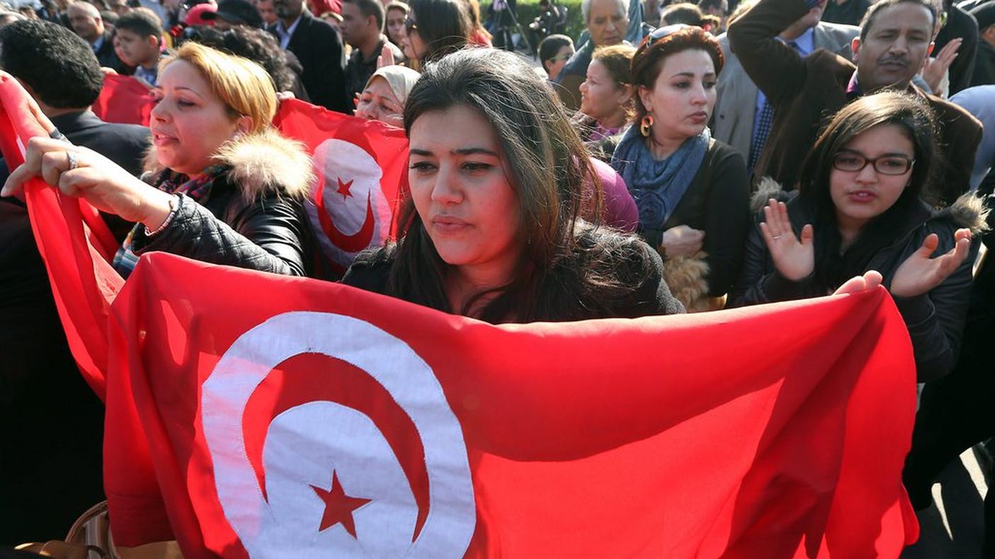 Molte bandiere tunisine al corteo