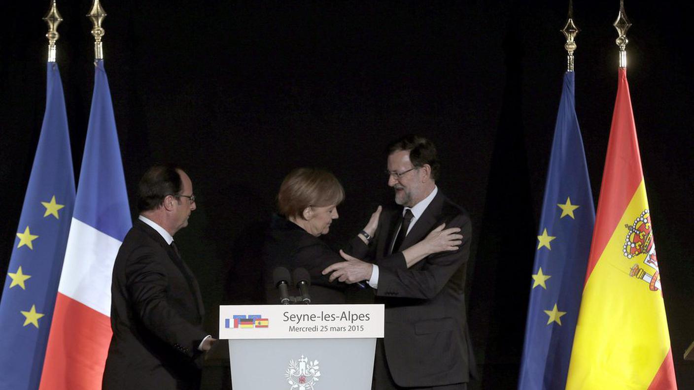Francois Hollande, Angela Merkel e Mariano Rajoy 