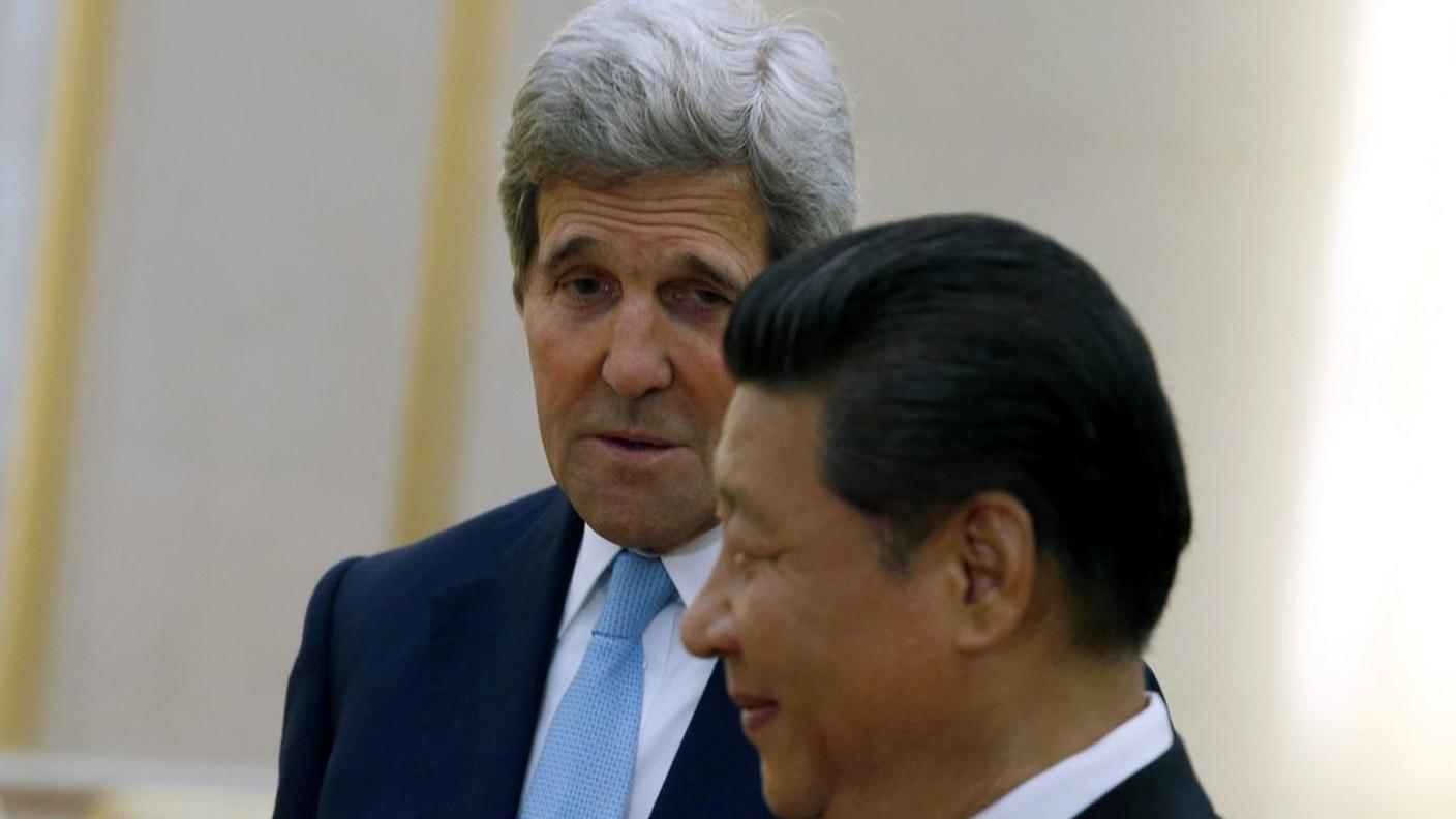 Il segretario di Stato statunitense John Kerry e il presidente cinese Xi Jinping