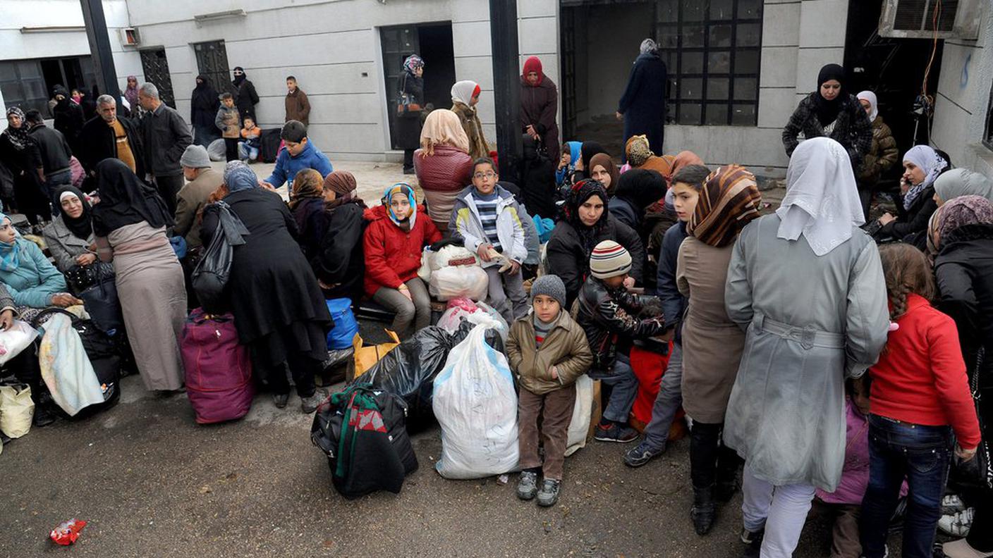 Famiglie siriane in fuga dalla guerra