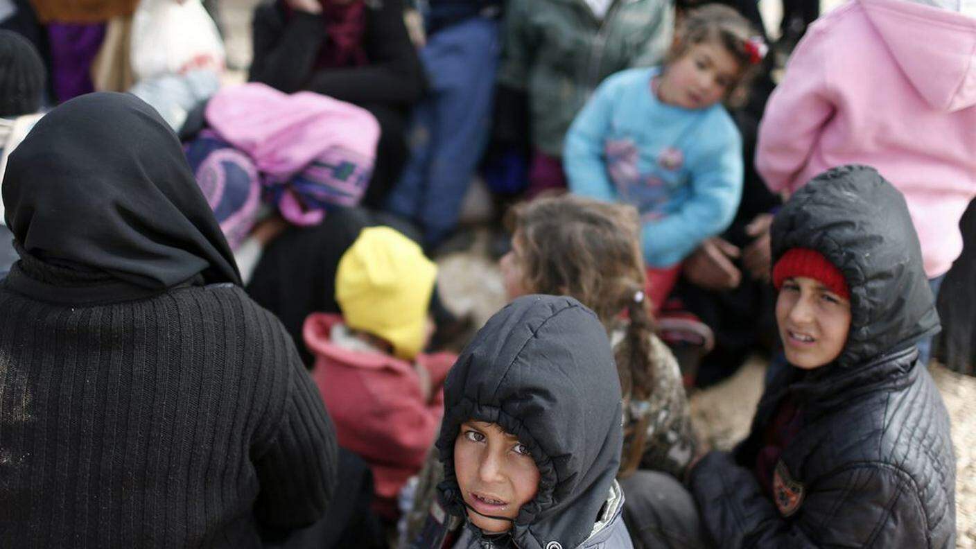 Bimbi siriani in fuga dalla guerra