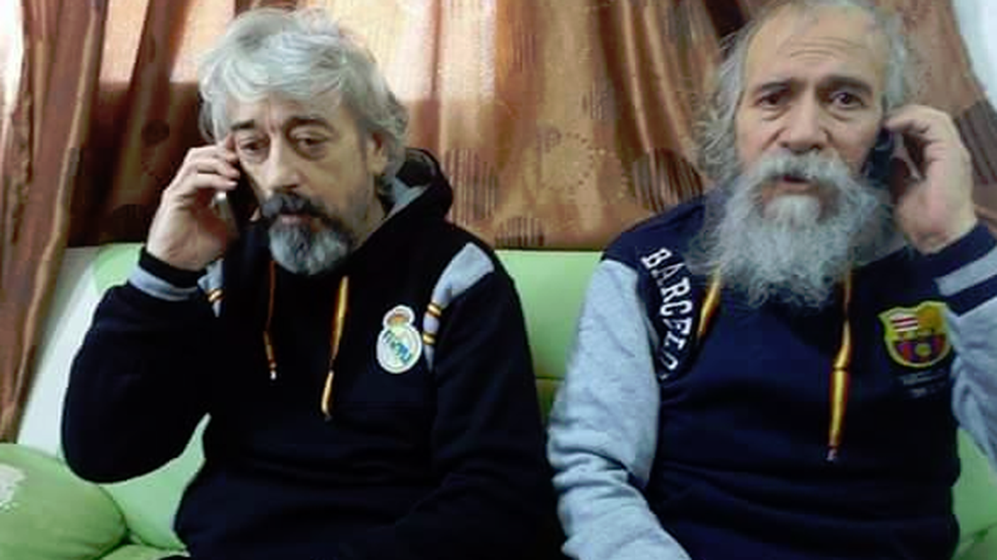 Gino Pollicardo e Filippo Calcagno al telefono dopo la liberazione