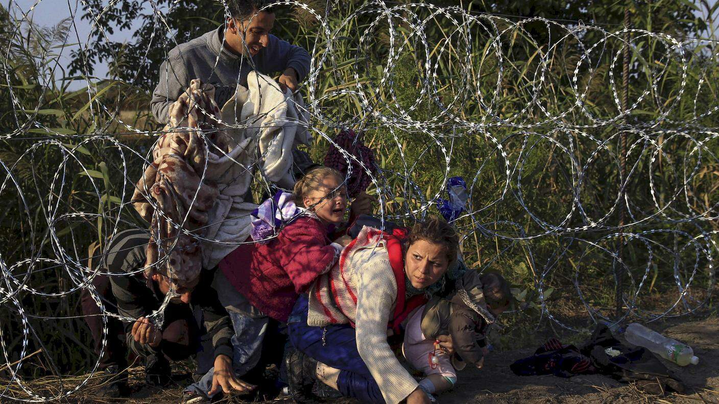 Una delle immagini sui migranti premiate con il premio Pulitzer