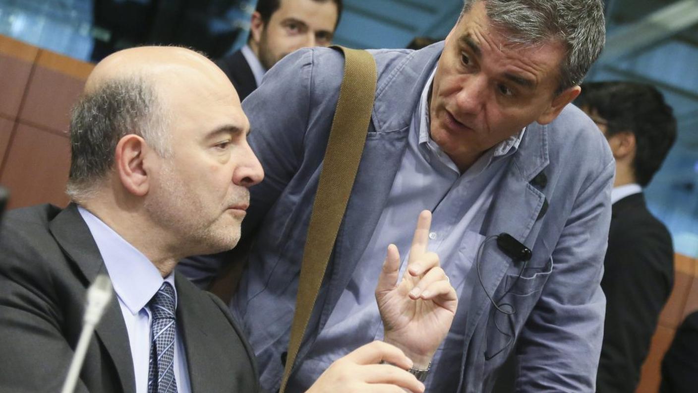 Il ministro greco Tsakalotos con il commissario economico Pierre Moscovici