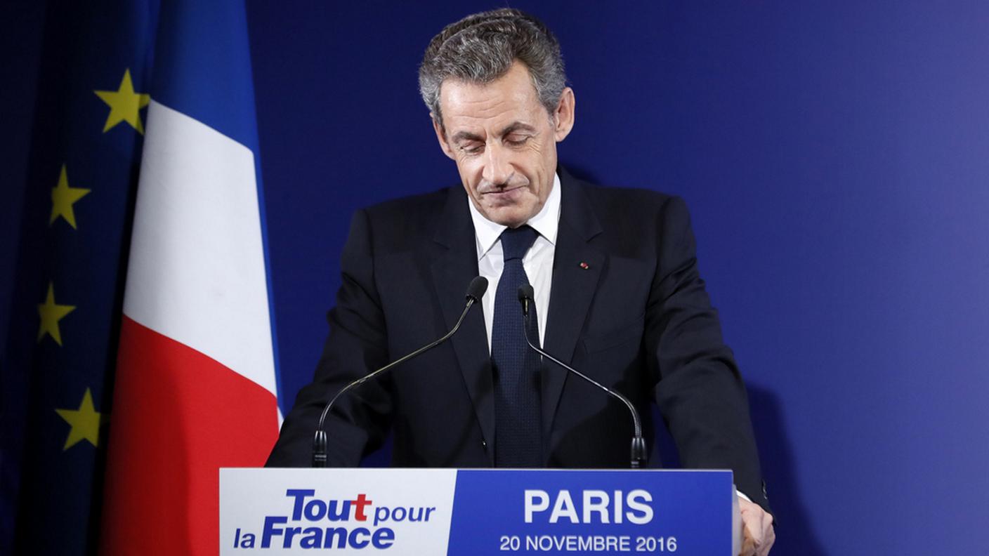 La delusione è chiaramente leggibile sul viso di Nicolas Sarkozy