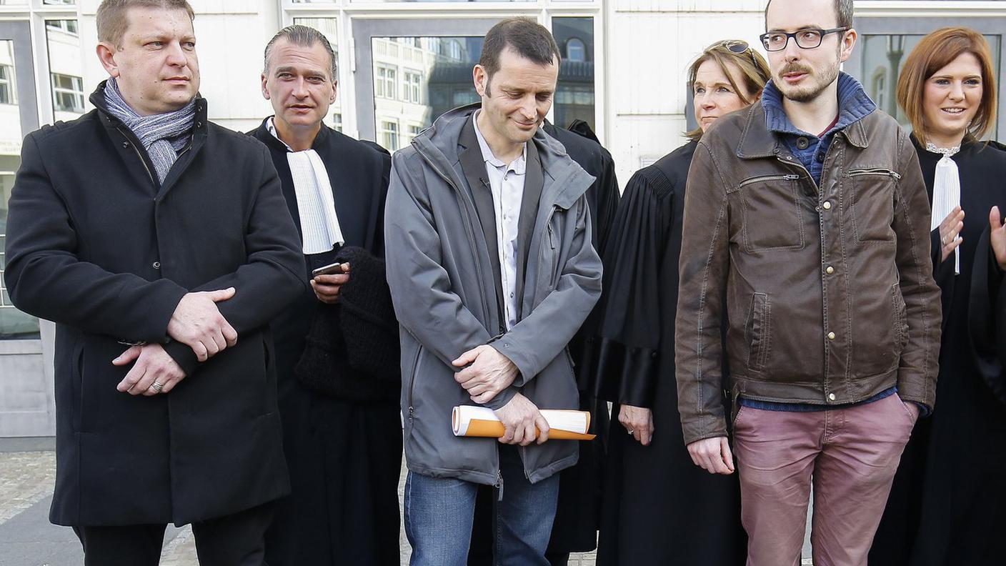 Halet, Deltour e Perrin all'uscita dal tribunale