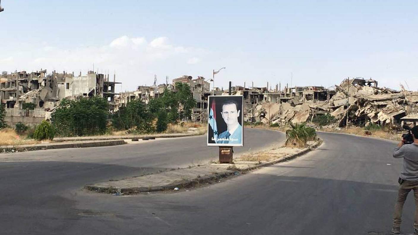 Homs, un uomo e la distruzione