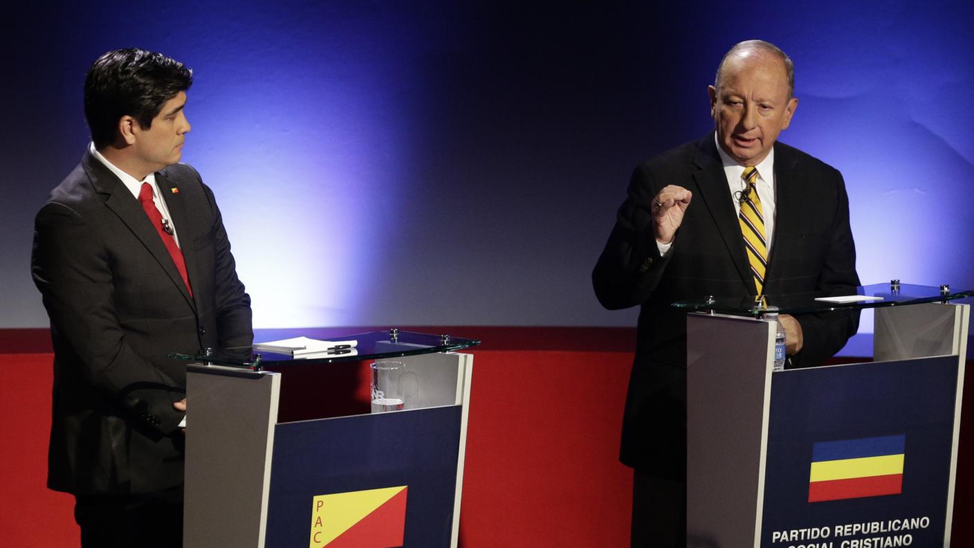 A sinistra il nuovo presidente Carlos Alvarado Quesada