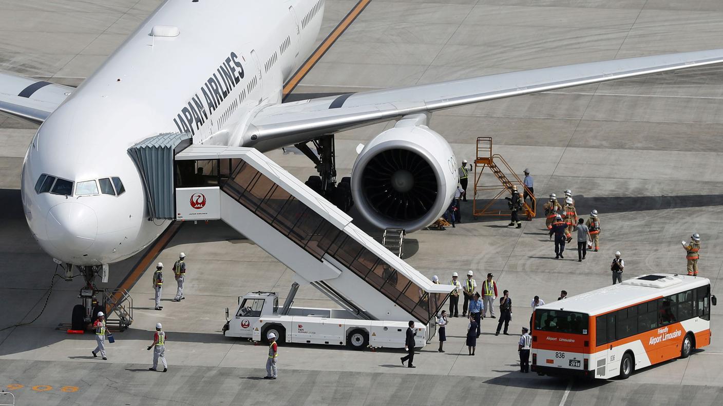 La coppia è stata bloccata subito dopo il suo arrivo all'aeroporto di Tokyo-Haneda