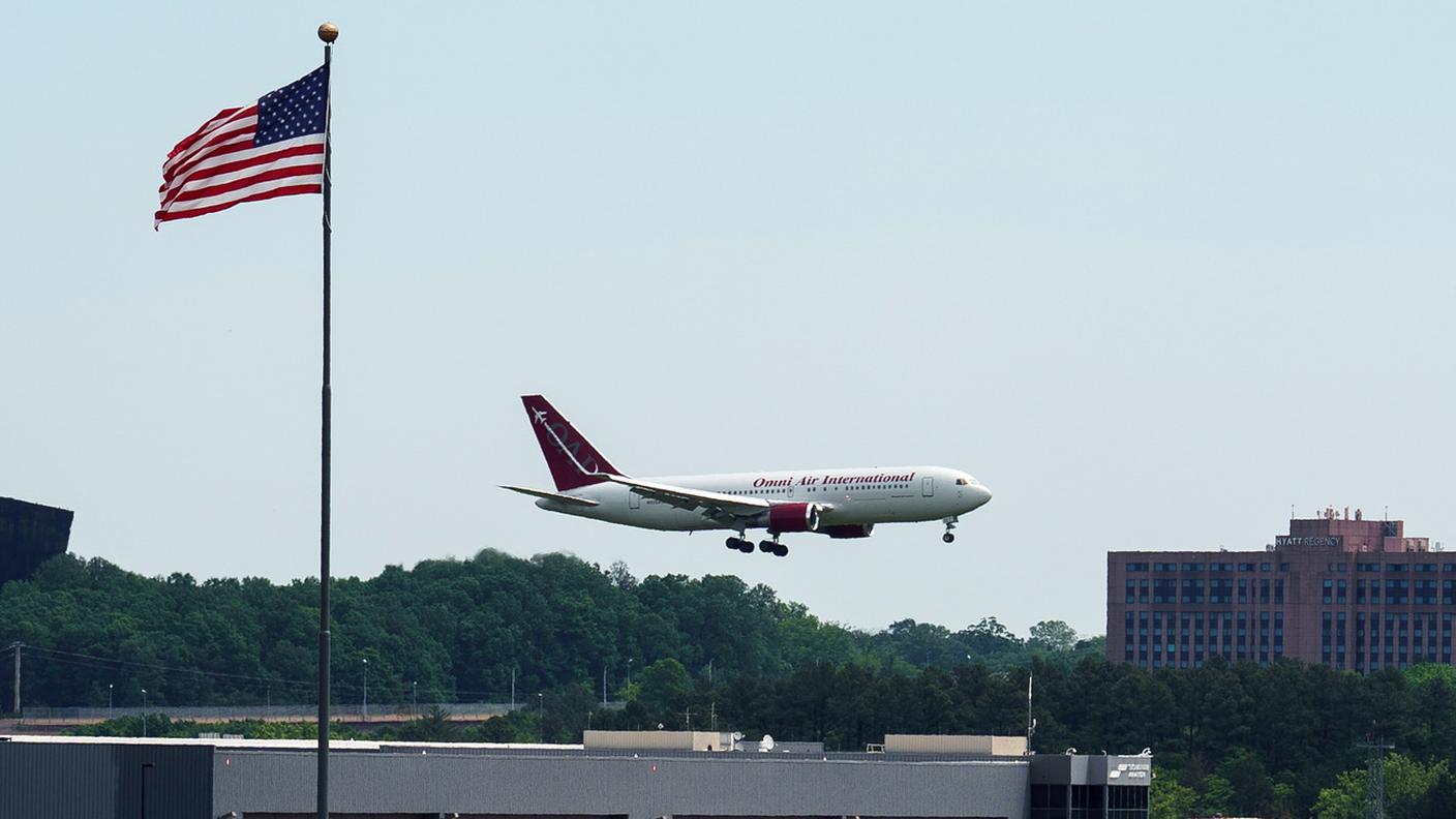 l'aereo che ha portato negli Stati Uniti 59 cittadini sudafricani nell'ambito di un piano di ricollocamento