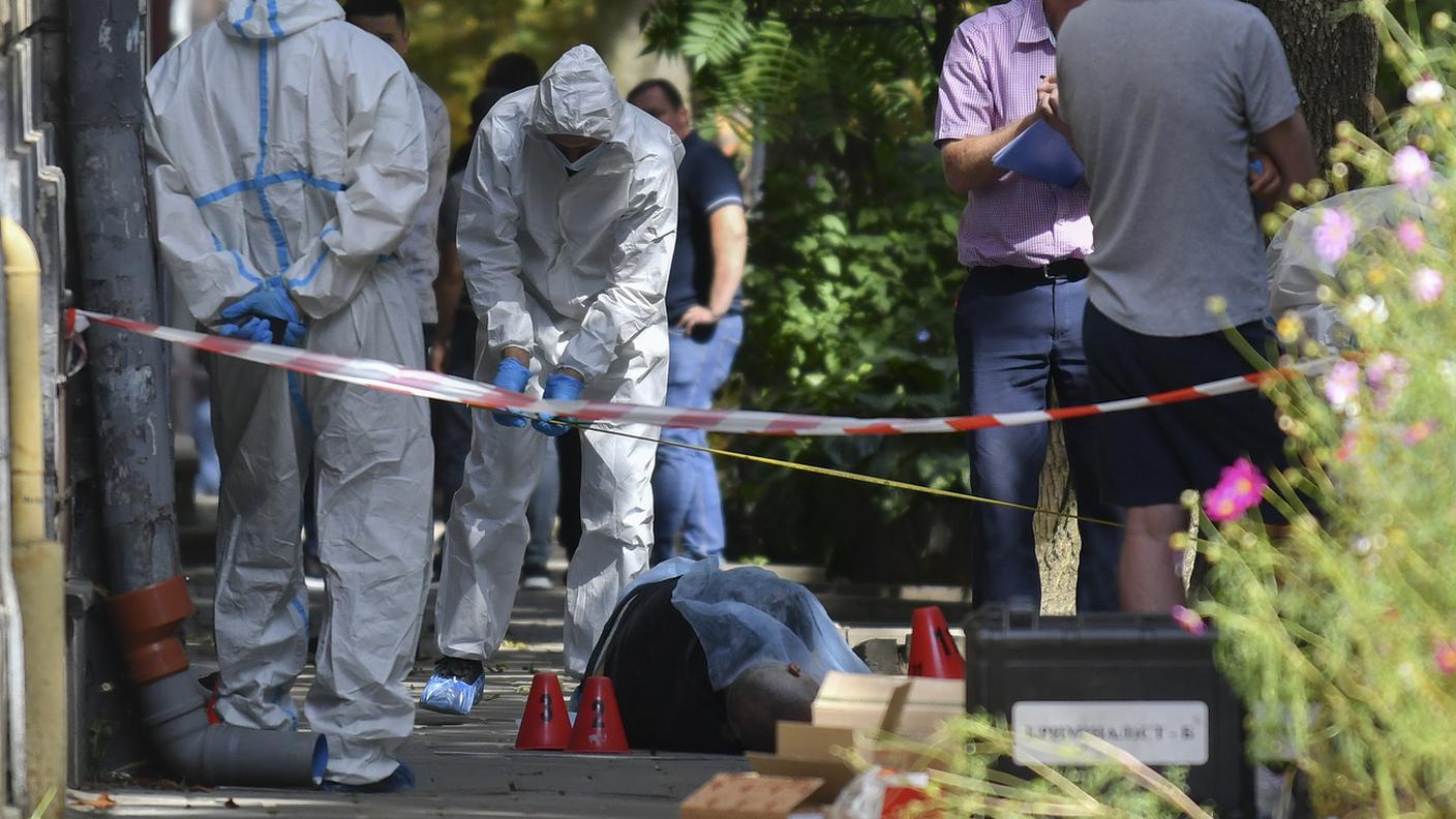 Gli esperti forensi sulla scena del crimine.jpg