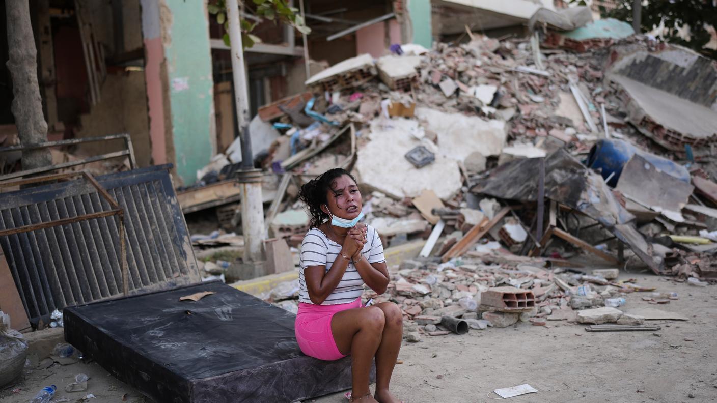 La disperazione di una delle tantissime persone colpite nello Stato di La Guaira