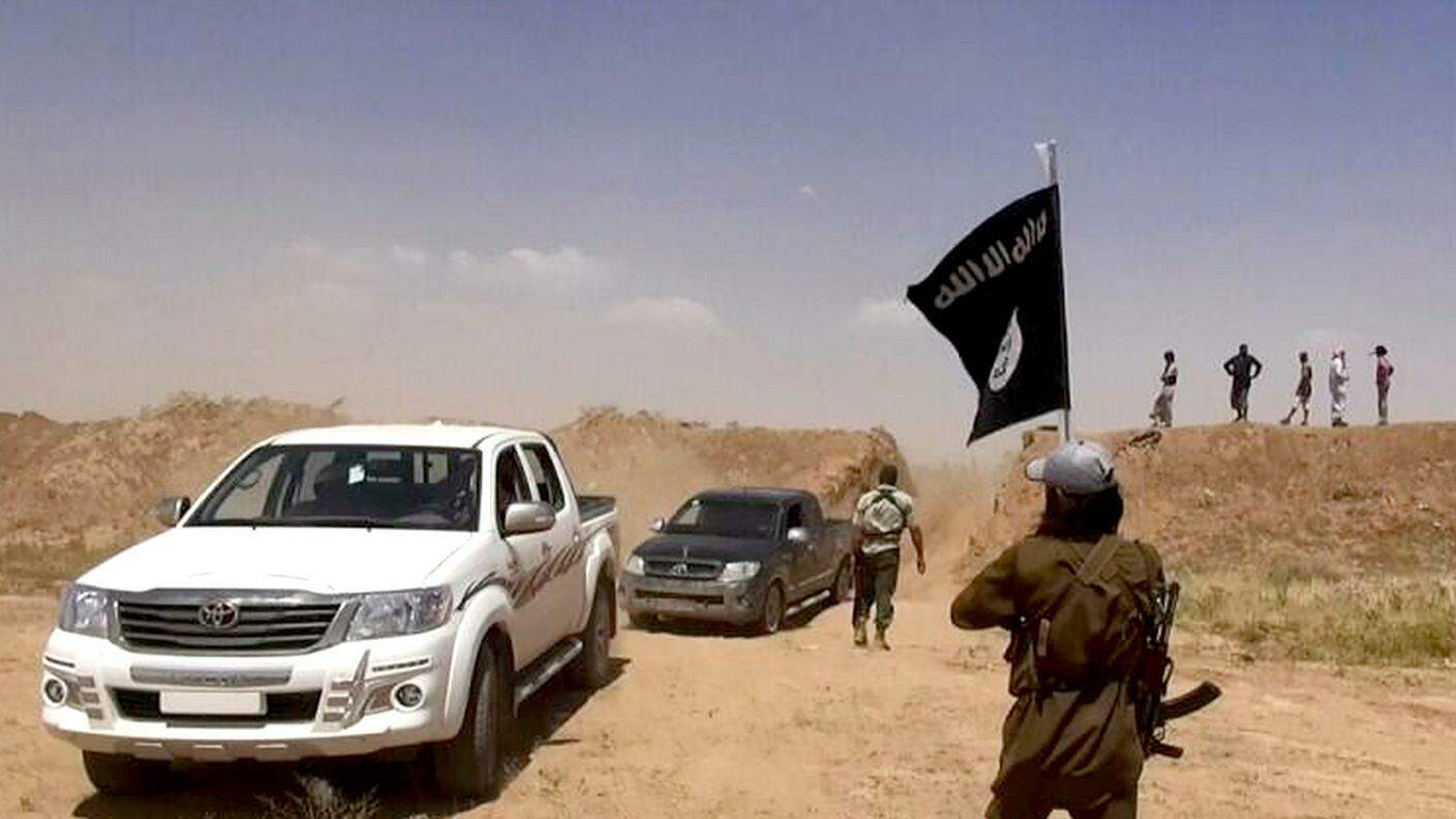 Militanti dell'ISIS sul confine tra Iraq e Siria