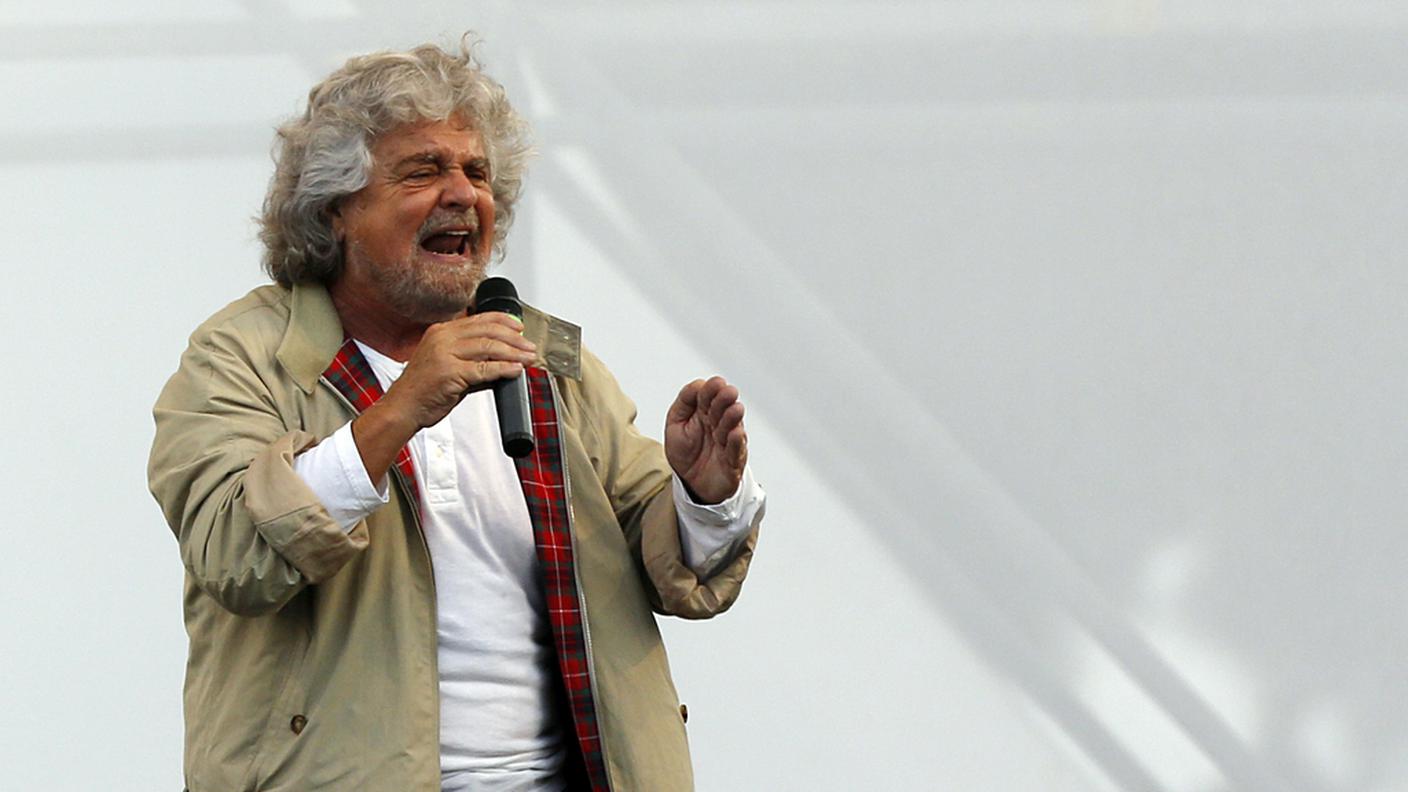 Beppe Grillo in uno dei suoi comizi