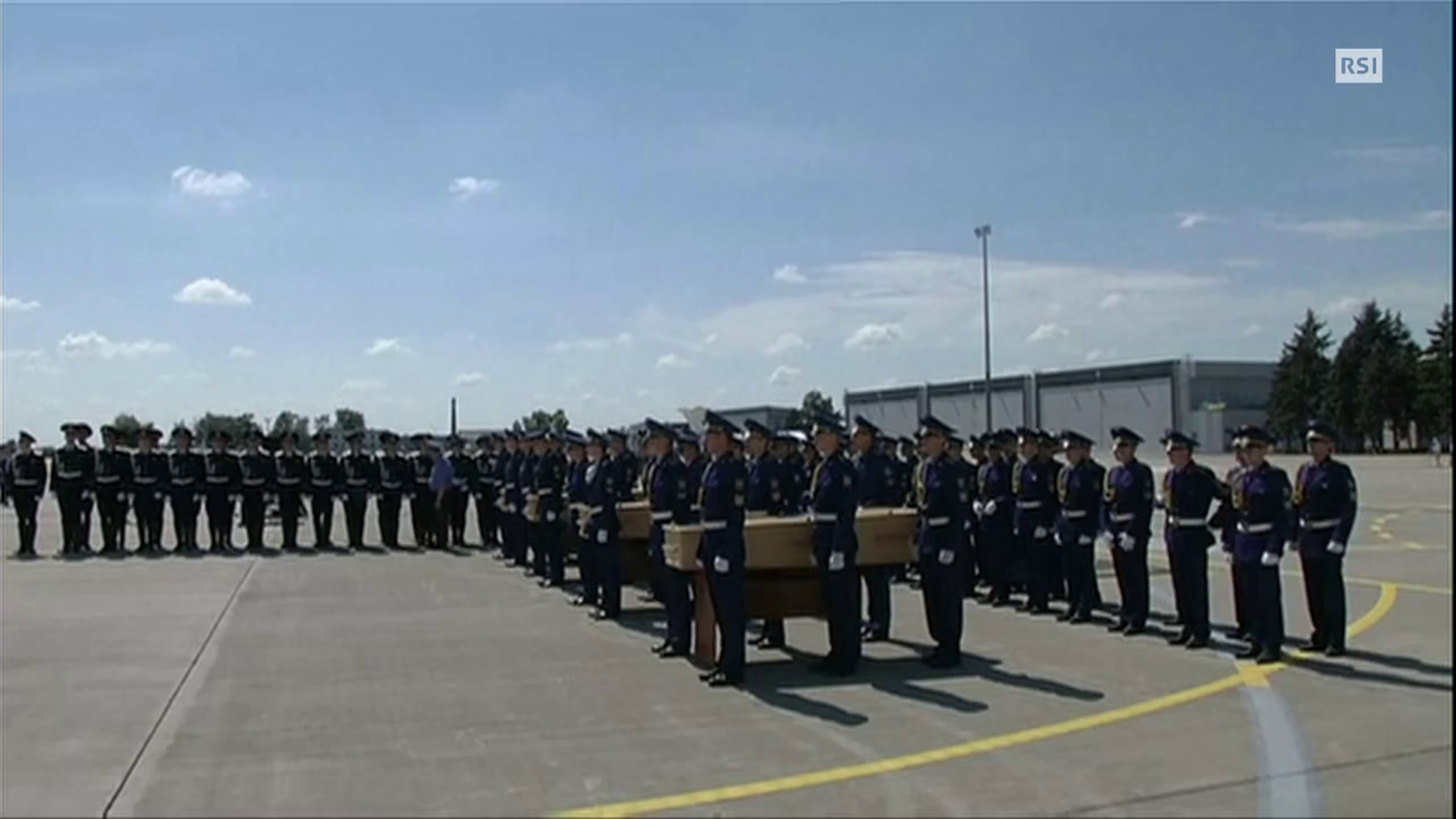 TG12.30 DEL 23.07.2014: "MH17, LE PRIME SALME DELLE VITTIME SONO PARTITE VERSO L'OLANDA" DI CHRISTELLE CAMPANA