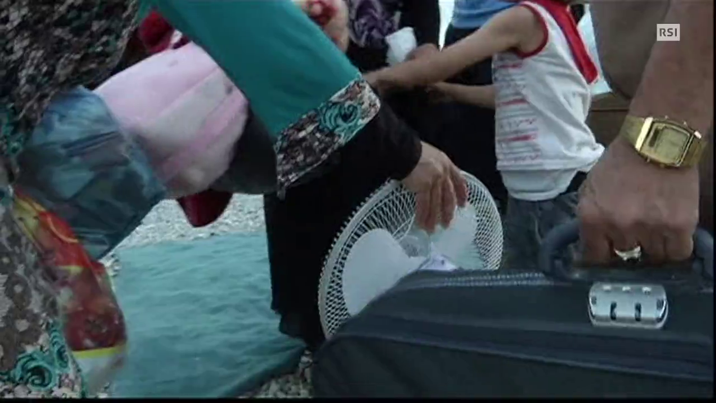 TG20 DEL 10/08/2014: "FUGA DALL' IRAQ" DI NICOLA AGOSTINETTI