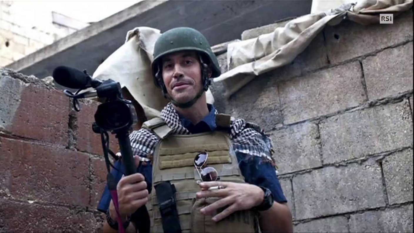 TG12.30 DEL 21.08.2014: " COLPEVOLE DI ESSERE AMERICANO " DI RICCARDO BAGNATO