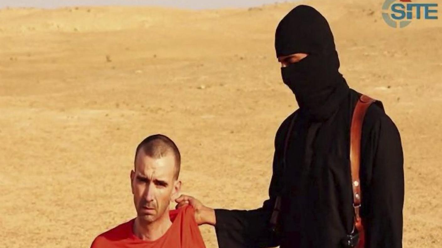 "John il jihadista" accanto al giornalista David Haines, da lui decapitato