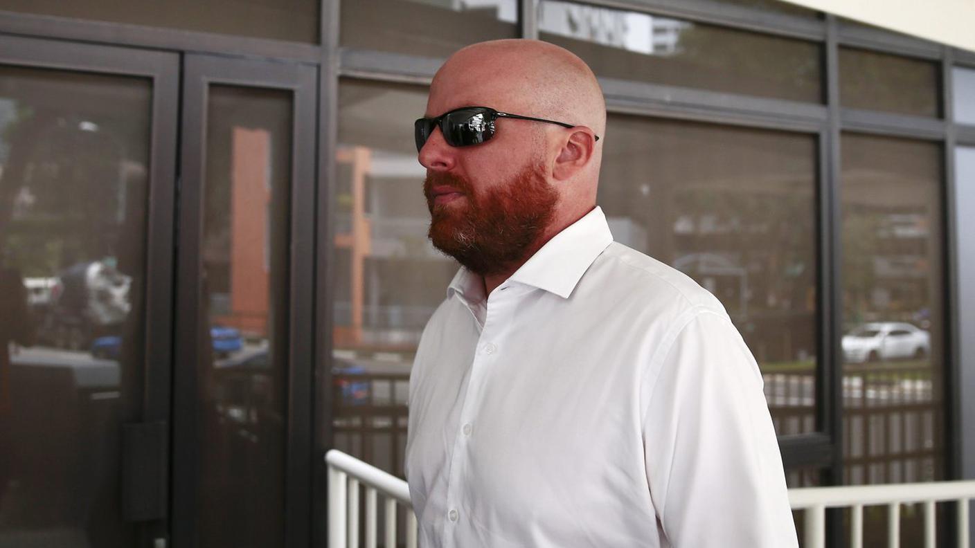 L'imputato al suo arrivo in tribunale