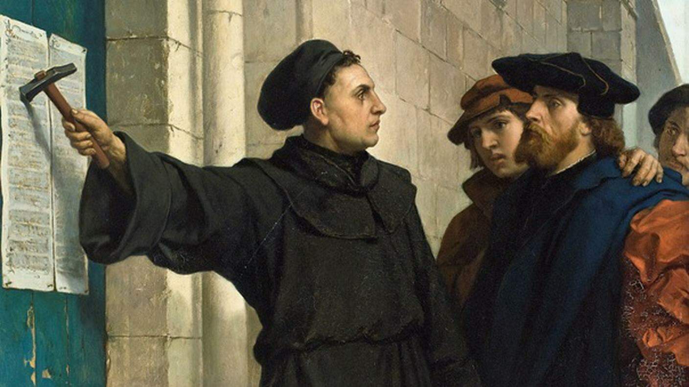 Martin Lutero illustra le sue 95 tesi affisse