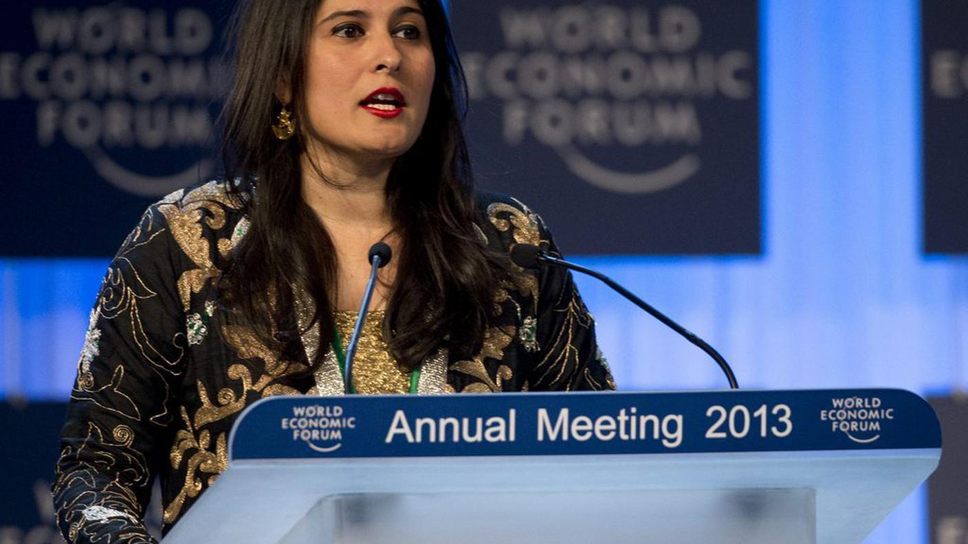 WEF Journalist and filmmaker Sharmeen Obaid-Chinoy of Pakistan speaks after receiving the Crystal Award during the annual World Economic Forum, ky.JPG